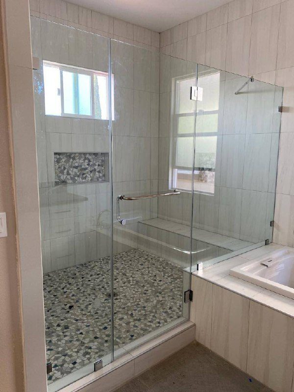 Bathroom remodel – chrome fixtures with pebble tile shower, Arcadia CA